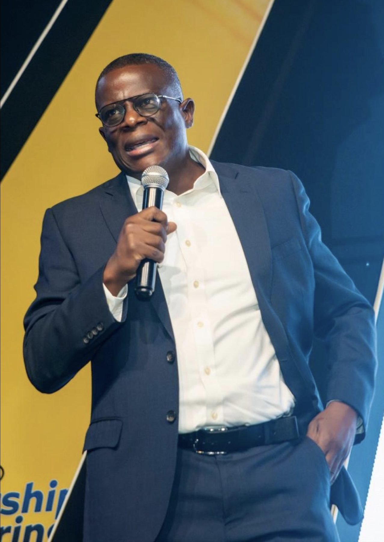 Olu Akanmu speaking at a conference